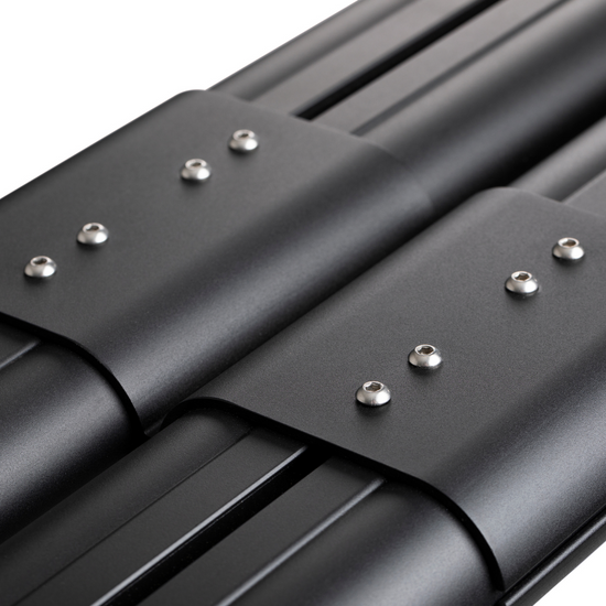 Close up image of high quality custom-made aluminum extrusions that create either 2 or 4 rod tubes for the River Quiver